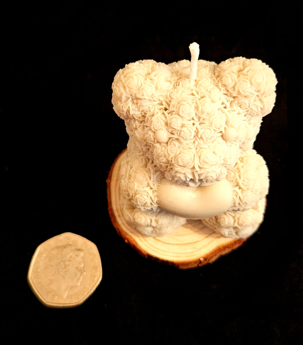 A charming handmade teddy bear crafted from flowers.
