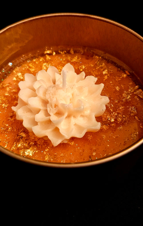 A delicately crafted, charming white flower candle.